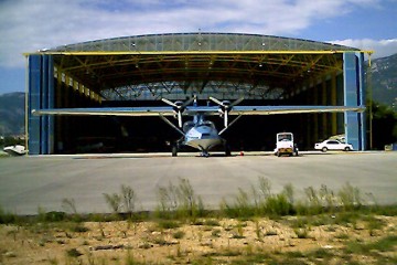 Space frame hangar with folding doors open